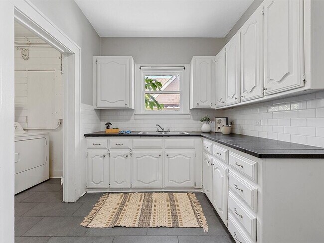 Building Photo - Charming 1924 Corner-Lot Home with Original Character and Modern Comforts