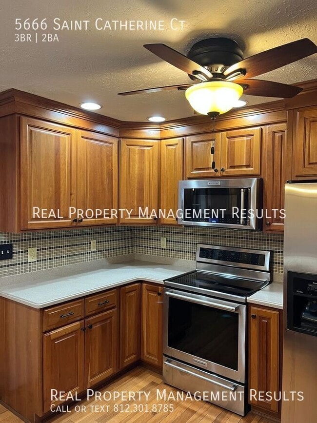 Building Photo - 5666 St Catherine Ct