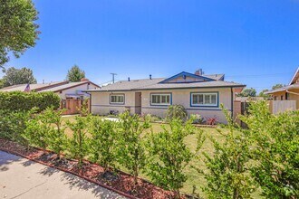 Building Photo - Stylishly Remodeled 4-Bedroom Home in Prim...