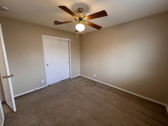 Building Photo - Generous Outdoor Space & Lawn Care Included!