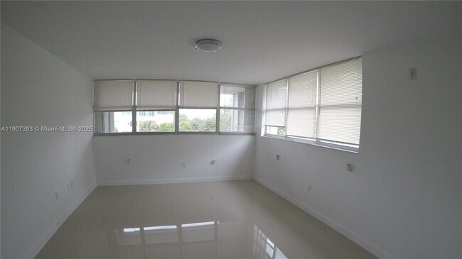 Building Photo - 10230 Collins Ave