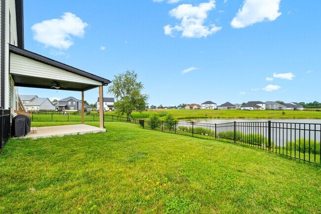 Building Photo - Stocked Pond, Walking Trails and More!!