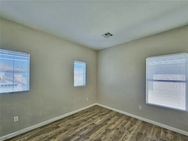 Building Photo - GATED SUMMERLIN HOME | 5 BEDROOM + DOWNSTAIRS DEN | 3-CAR GARAGE