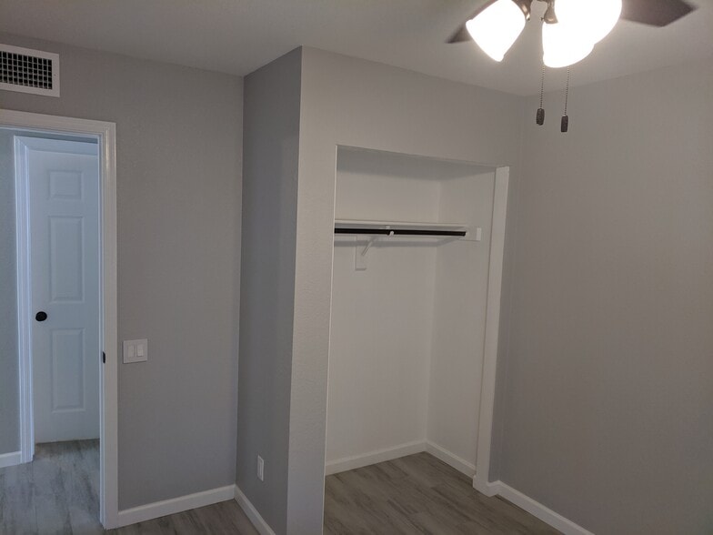 Room 3 - with fan and closet (No doors) - 14101 N 78th Dr