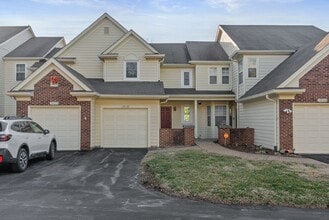 Building Photo - COMING SOON - Spacious 2-Bed, 3.5-Bath Townhouse with Stunning Lake Views