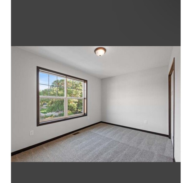 Building Photo - 10277 3rd St NE