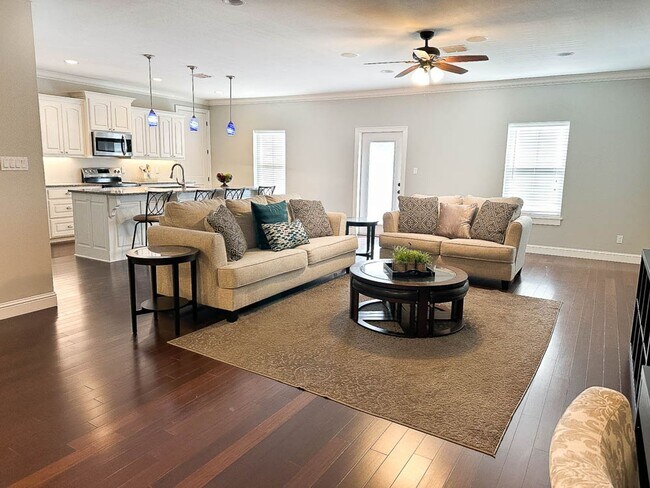 Building Photo - Furnished and utilities included!  1 bedroom garage apartment in *Stonewall* gated neighborhood!