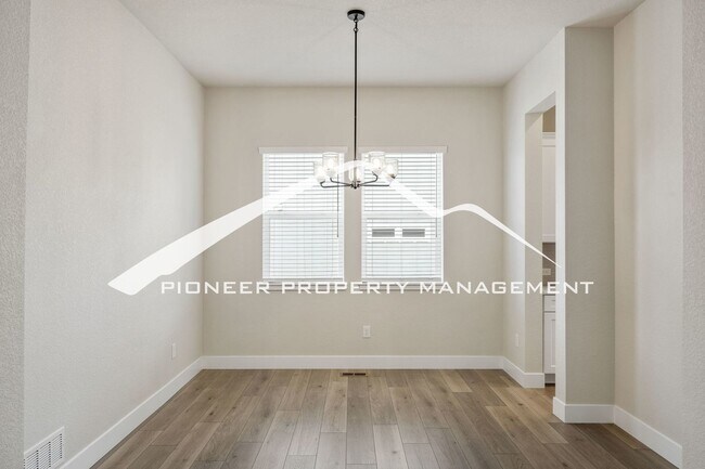 Building Photo - Main Floor Primary Home in Flying Horse with 5 Bedrooms, Gourmet Kitchen, Finished Basement & 4-C...