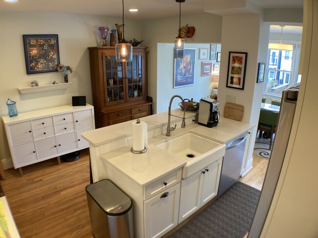 Kitchen with bar. - 526 24th St NE