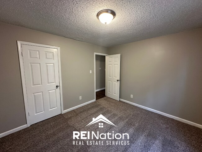 Building Photo - CORDOVA COVE CHARMER! 3BR/2BA | High Ceilings & Brick Fireplace | 2-Car Garage!