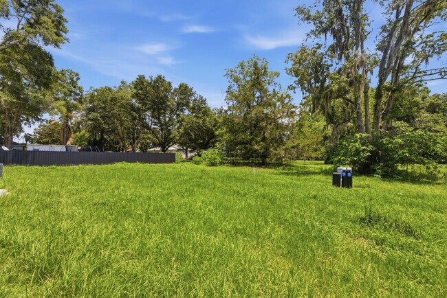 Building Photo - Available Now! New 3/2 Home with Large Backyard and Front Porch