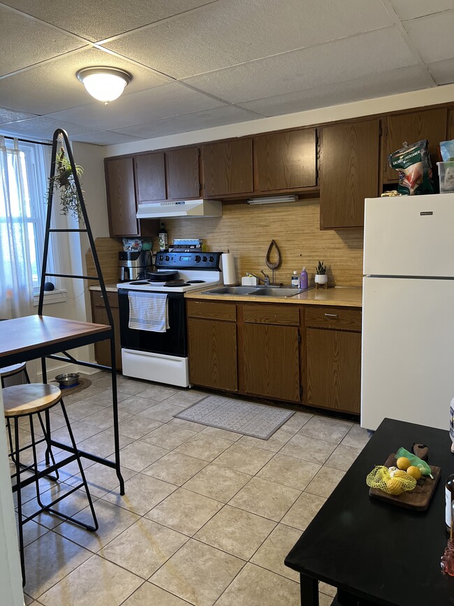 Kitchen before new cabinets - 128 W Main St