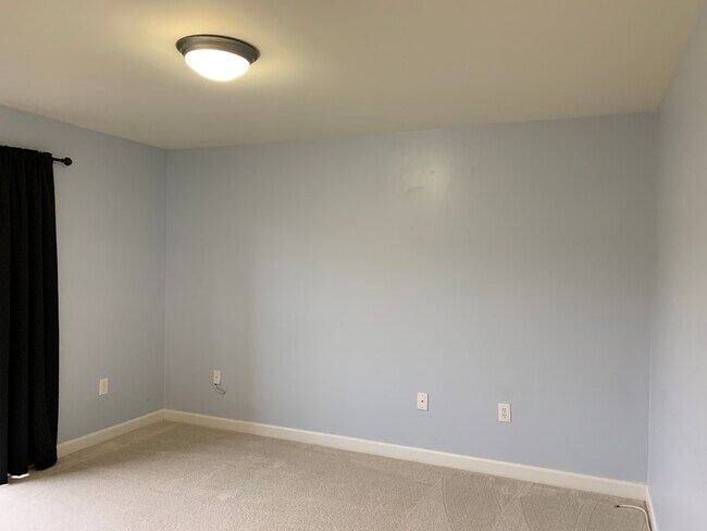 Main level master bedroom with big walk-in closet - 6916 Fairfax Dr