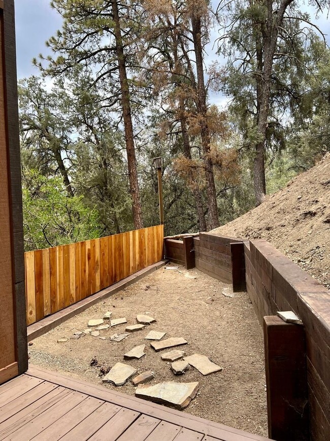 Building Photo - Cozy 3-Bed 2-Bath Cabin-Style Home Nestled...
