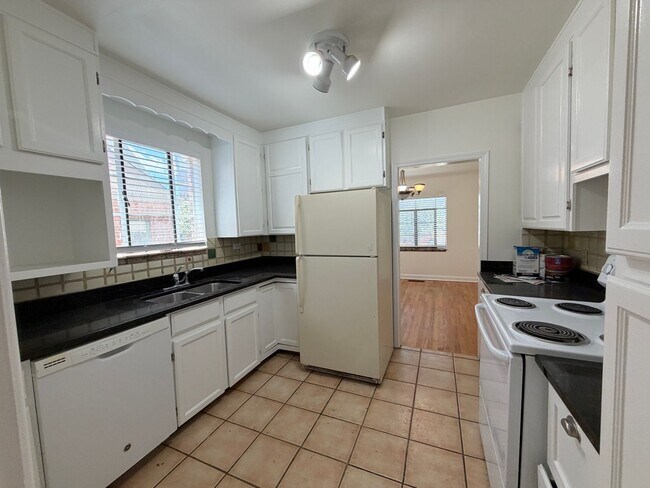 Building Photo - Classic Wash Park Gem with Detached Garage, Finished Basement & Stunning Great Room Addition