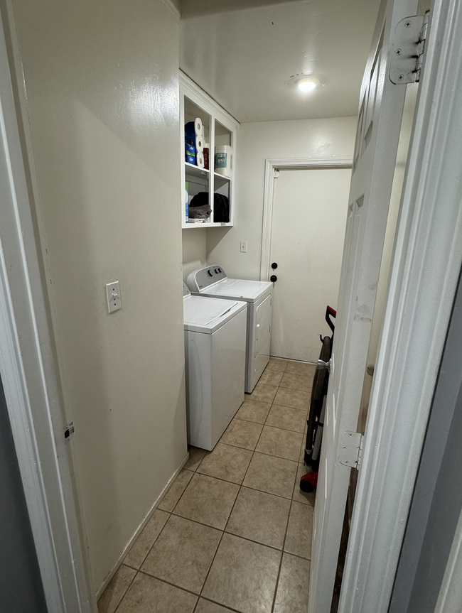 Laundry room (washer and dryer hook ups, no appliances) - 3920 Teal St