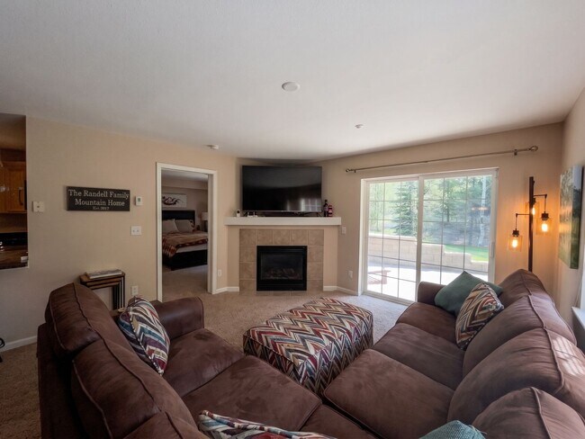 Building Photo - Two-Bedroom Condo with Attached Garage, Available Now