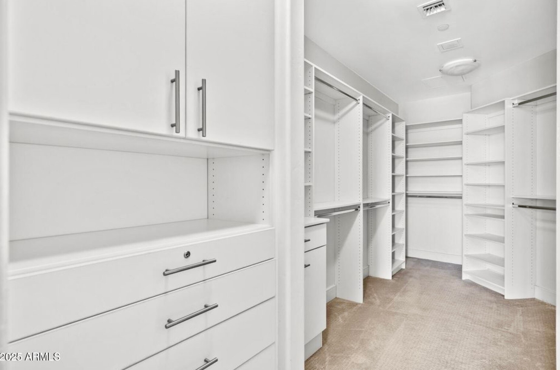 Walk in primary suite closet - 2211 E Camelback Rd