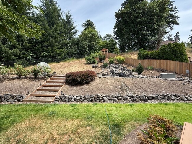 Building Photo - Light-Filled 3 Bedroom Retreat with Waterfall & Fully Fenced Yard