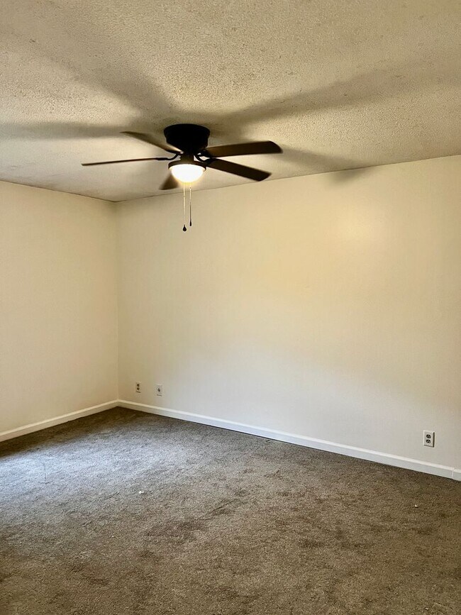 Building Photo - Charming 3-Bedroom, 2-Bathroom Home with Sunroom & Flex Room