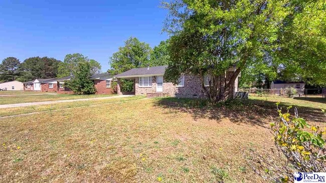 Building Photo - 1109 E Macree Terrace