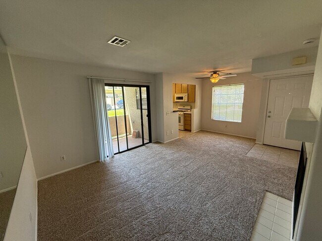 Building Photo - 1 Bed, 1 Bath Condo - Fireplace + Private Patio w/ Washer/Dryer!