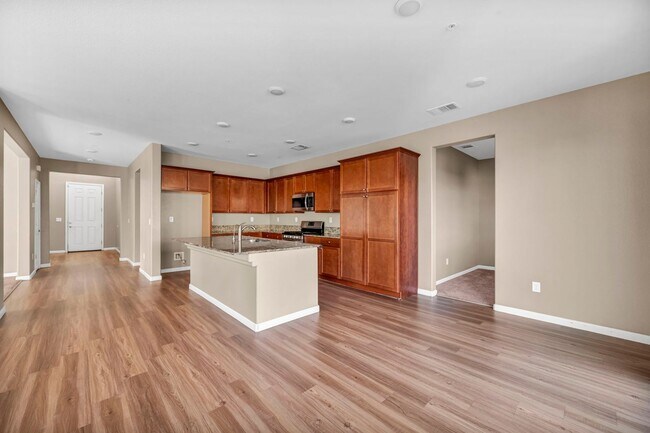 Building Photo - Sun-Filled, Spacious Living with a Three-Car Garage