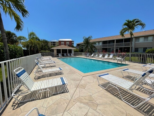 Building Photo - ANNUAL RENTAL - 3 BED / 2 BATH WITH CARPOR...