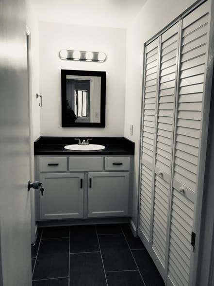 Vanity/laundry area - 406 Skyview Dr