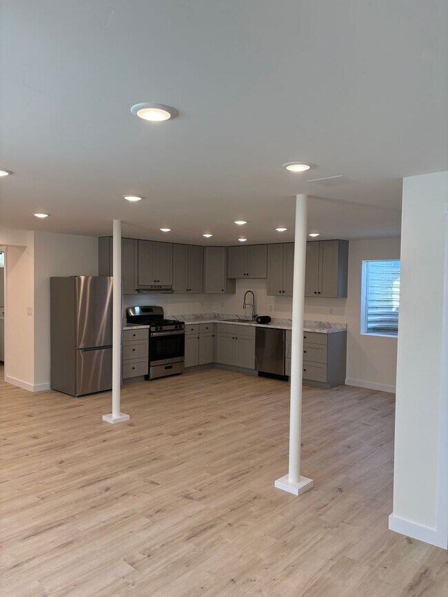 Building Photo - NEWLY RENOVATED 2 bed/ 1 bath Basement Apartment for Rent – All Utilities Included