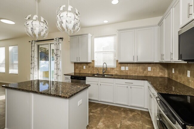 Building Photo - 5594 Angelonia Terrace