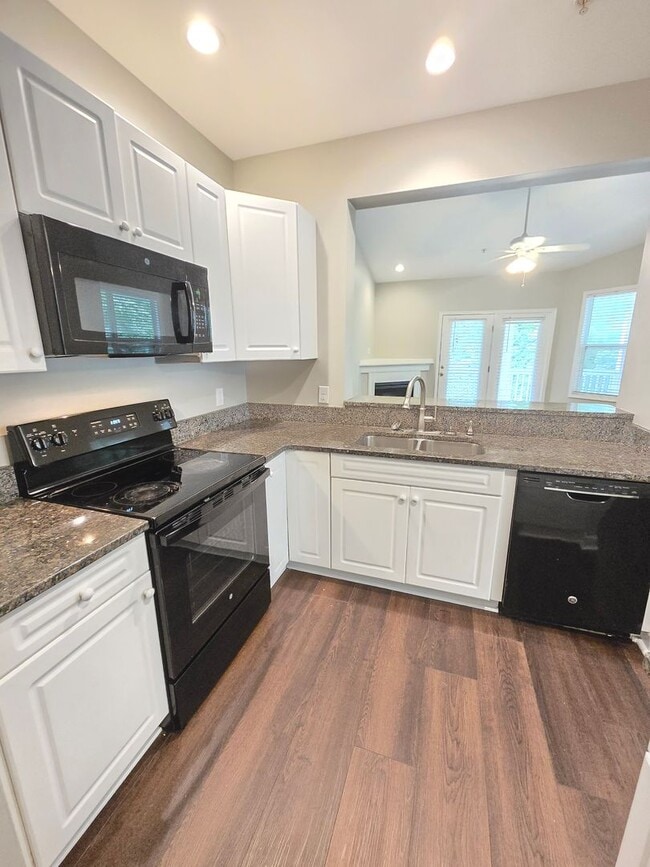 Building Photo - Cape Cottages Condos - 3BD/2BA - Less than...