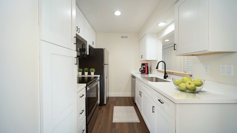 Remodeled Kitchen Furnished - Hawthorn Suites Apartments