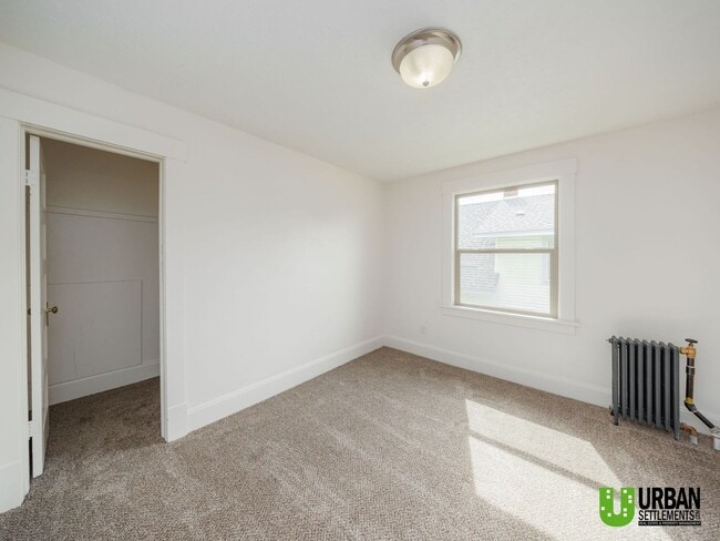 Building Photo - Spacious 4-Bedroom Home with 2-Car Garage, Basement Storage & Flexible Living Space in North Spokane