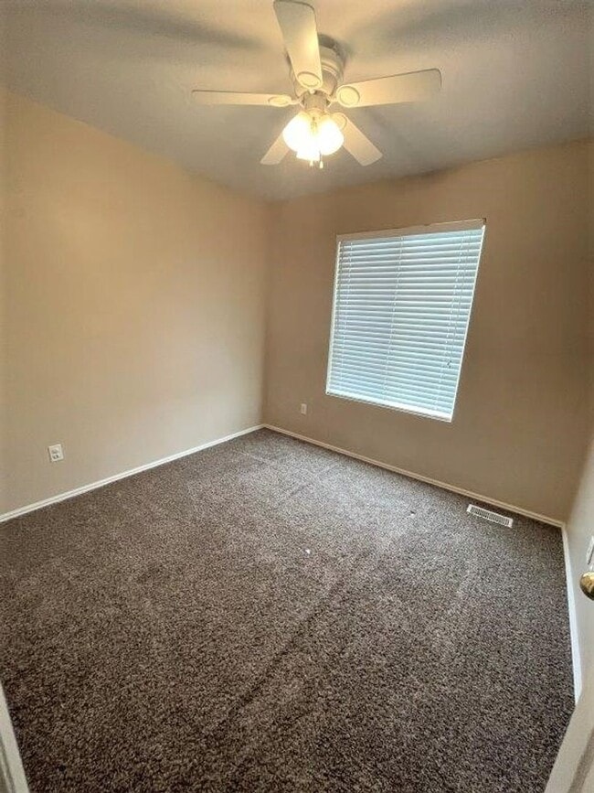 Building Photo - Move-In Ready 5-Bed with Garage, Yard & Up...