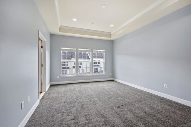 Building Photo - 3 BEDROOM, 4 BATHROOM TOWNHOME AVAILABLE MARCH 15th SUMMERFIELD RESIDENCES AT VICTORY PROMENADE!
