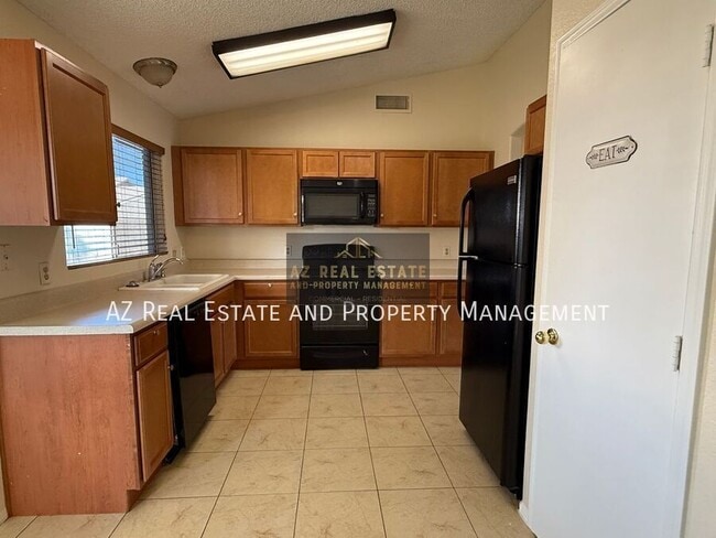 Building Photo - 8528 W Pershing Ave
