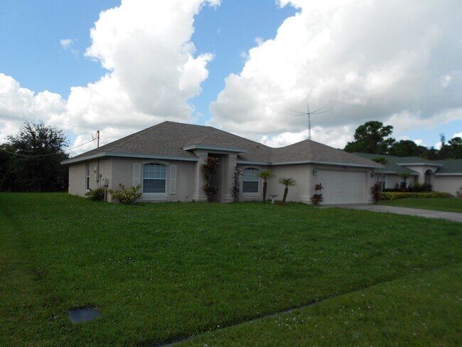 Building Photo - 3/2/2 with home with 1412 living sqft is c...