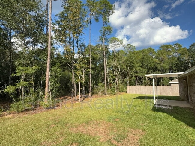 Building Photo - 6902 Trailride N