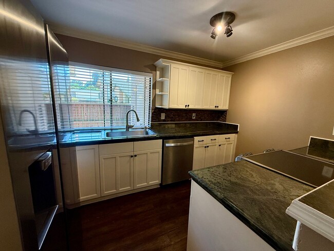 Building Photo - Spacious 3 Bedroom Townhome in Mission Valley! Two Private Patios! Two Assigned Parking Spaces! I...
