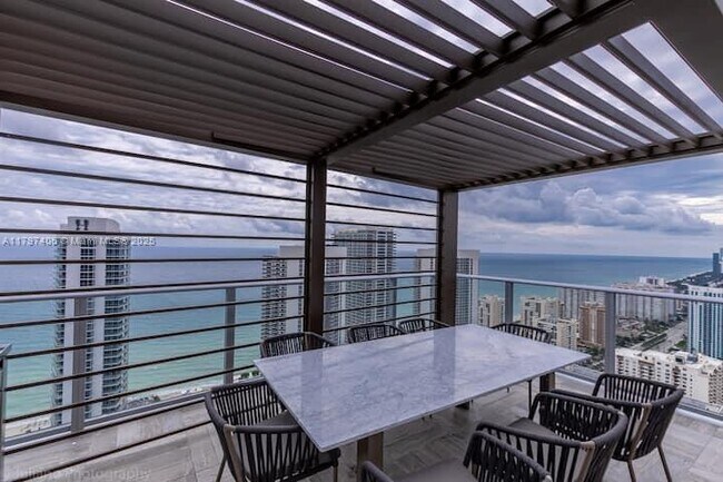 Building Photo - 4010 S Ocean Dr