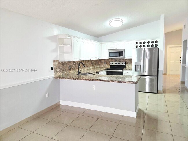 Building Photo - 7789 W 34th Ln