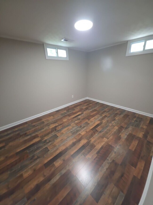 Building Photo - Spacious 4-Bedroom Home in Baxter with Large Yard, Hardwood Floors & Outdoor Shed