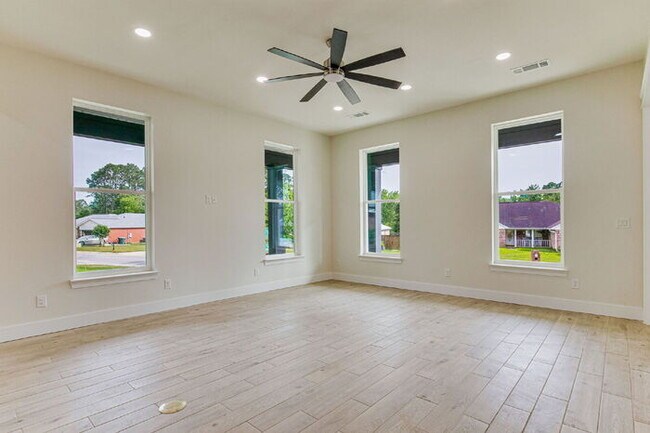 Building Photo - This luxurious new custom home in the sought-after Shadow Grove subdivision is a masterpiece of m...