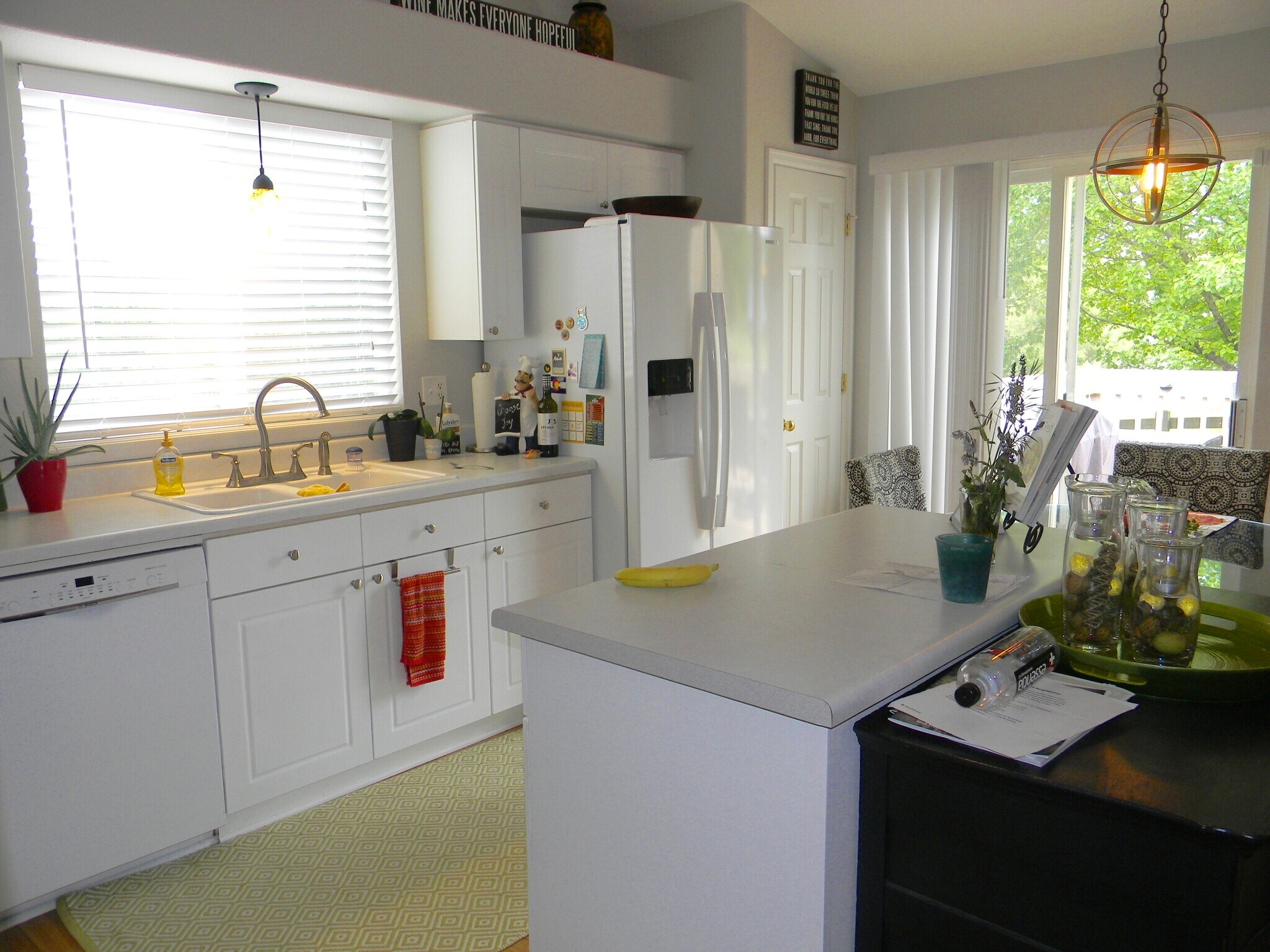 Kitchen out toward deck - 5835 S Harlan St