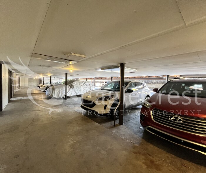 Building Photo - Convenient 2 Bedroom 2 Bathroom Condo Living "In The Trees" with On-Site Amenities