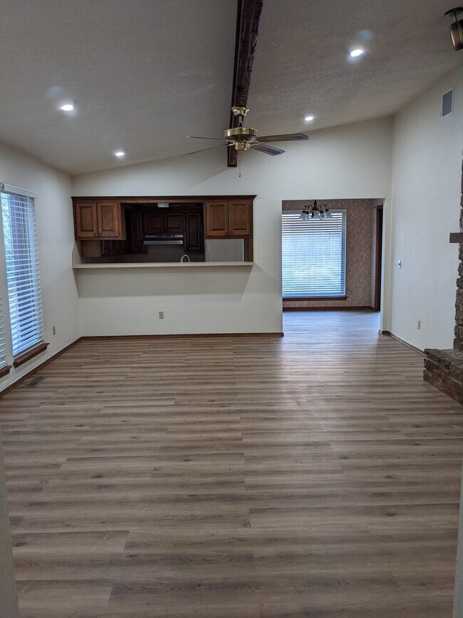 Living room with New LVP flooring - 1618 Julie Plz