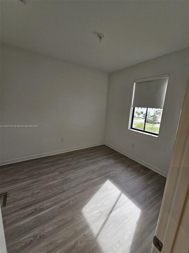 Building Photo - 11083 West 33rd Ct