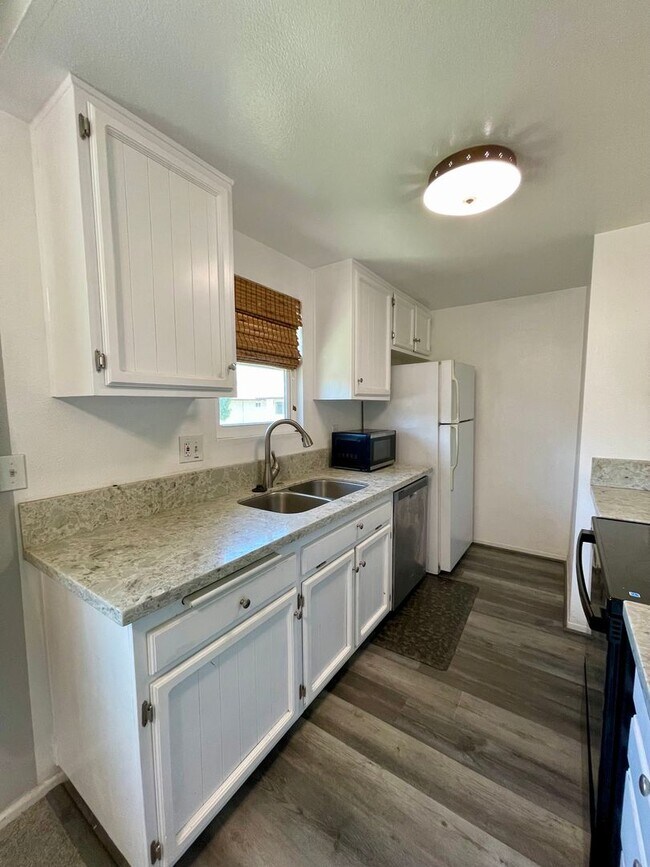 Building Photo - 2 bedrooms, 1 bath with carport Home is Close to the 52, 67 and 125 freeways, shopping and restau...