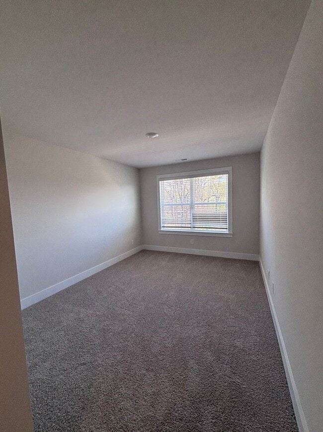 Building Photo - Brand new three-bedroom, 2.5-bath townhome